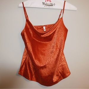 Spaghetti strapped, vibrant top!